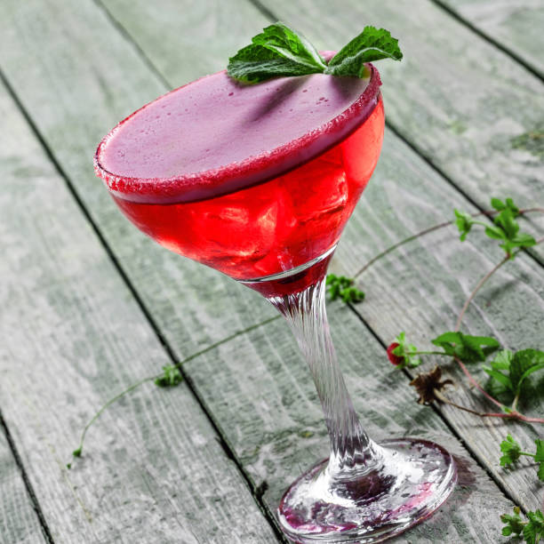 istock Glass of alcoholic raspberry and mint cocktail 865714126