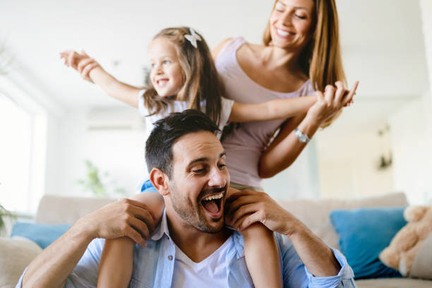 istock Happy family having fun times at home 865717214