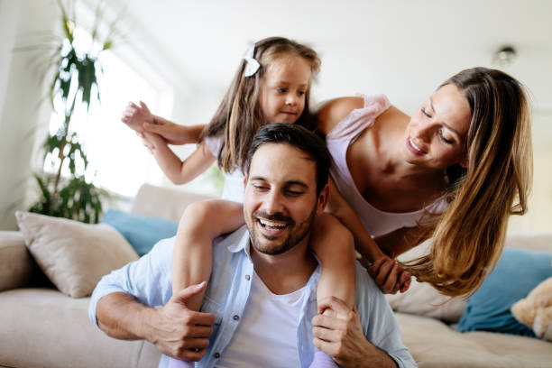 istock Happy family having fun times at home 865717414