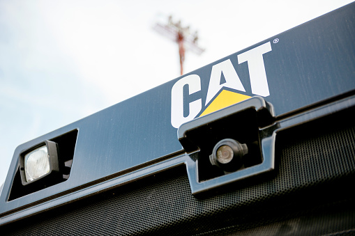 Paris: Rear-view camera on the yellow bulldozer tractor constriction industrial machine with CAT Caterpillar logotype
