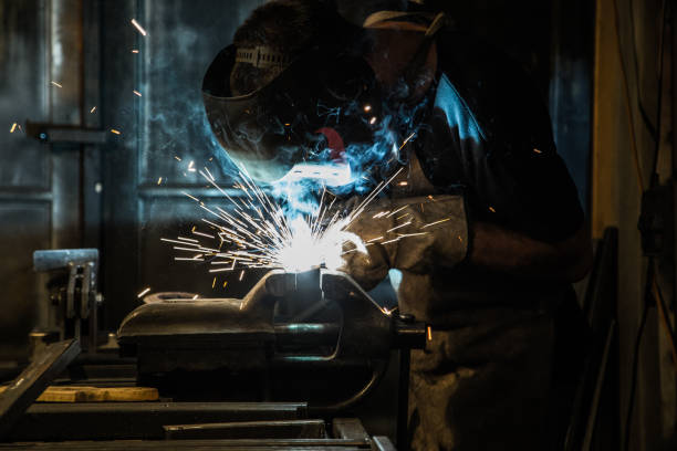 istock Colorful Details of Sparks from a welding torch 865724428