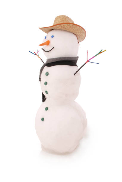 istock White snowman with scarf and cowboy hat. 865724520