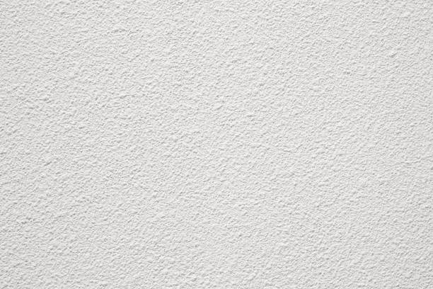 istock rough texture of the white wall background 865724700