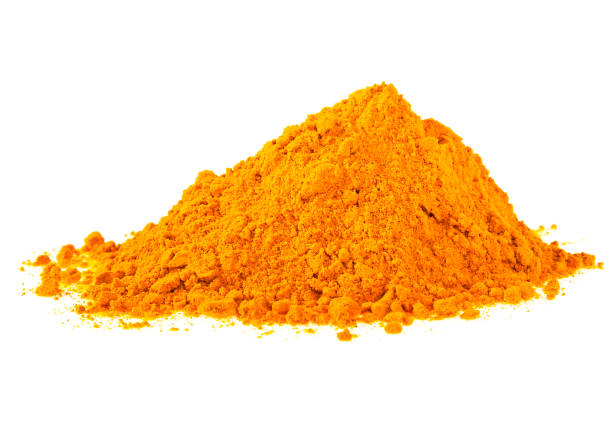 istock Turmeric (Curcuma) powder isolated on a white background 865725254