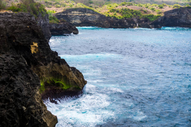 istock Cliffs at Nusa Penida, Bali, Indonesia 865729726