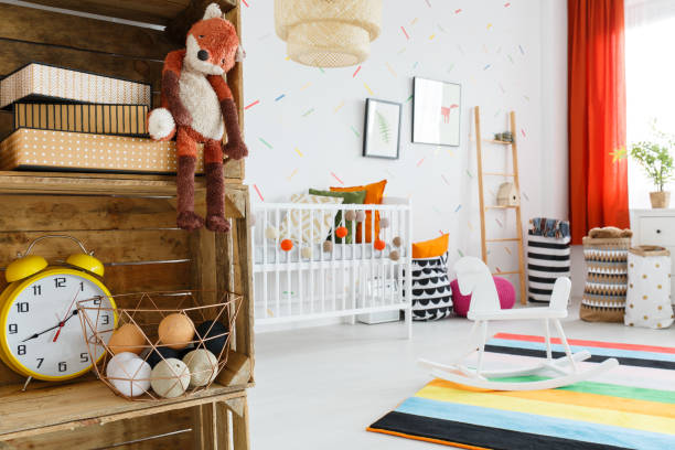 istock Yellow clock on wooden shelf 865733230