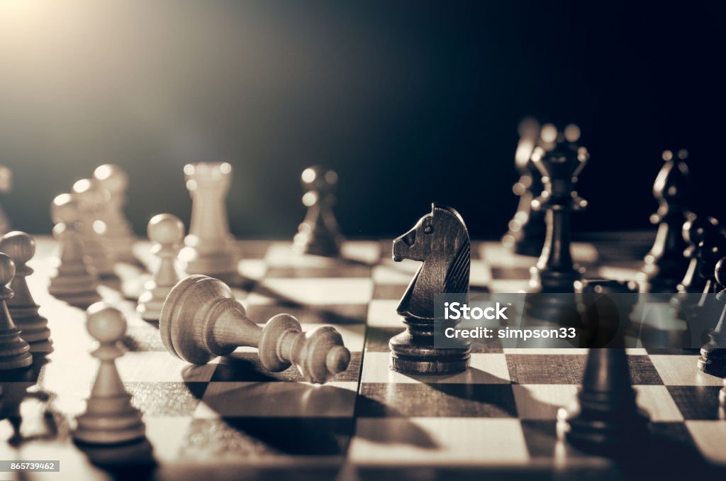 Chess financial business strategy concept. Chess financial business strategy concept. King loses the fight Chess Stock Photo