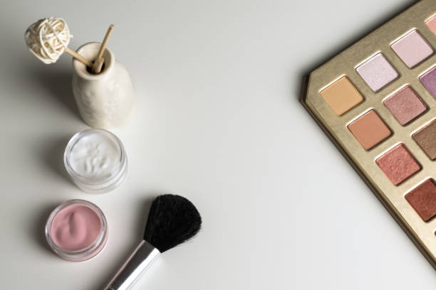 istock beauty concept : cosmetics top view on a white table. Workplace, cosmetic bag 865741388