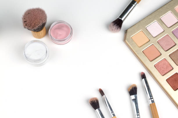 istock beauty concept : cosmetics top view on a white table. Workplace, cosmetic bag 865741468