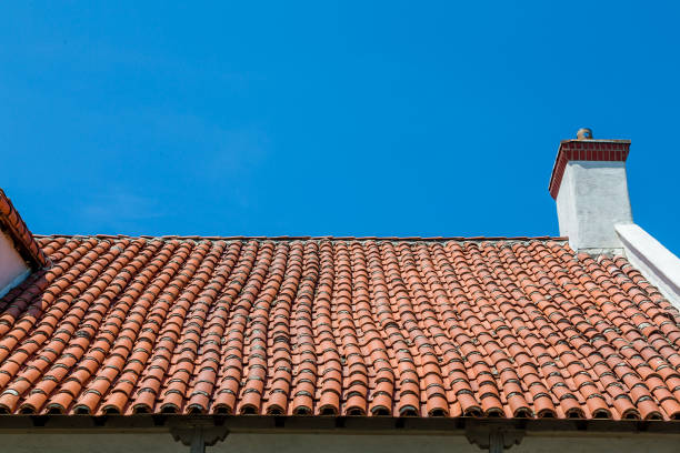 istock Hand Laid Tile Roof Under Blue Sky 865757064