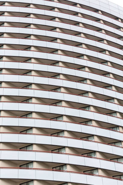 istock Many Balconies on Curved Glass Hotel 865757476