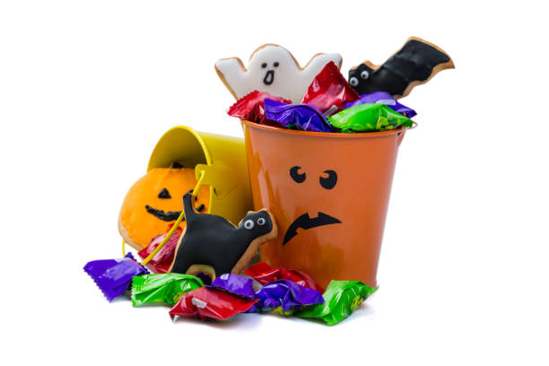 istock Halloween concept - basket with candies and ccokies 865757816