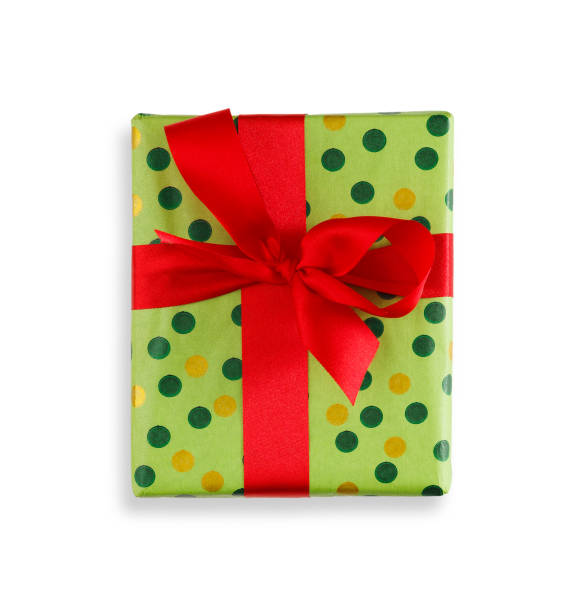 Gift box wrapped in green paper and red ribbon