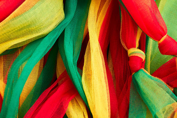 istock Red, green and yellow fabric, abstract background 865771964