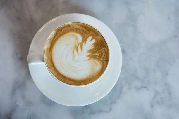 istock A cup of Latte art coffee on table 865773322