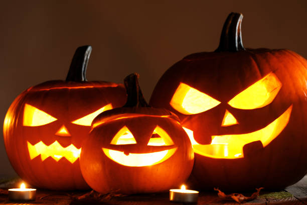 istock Halloween pumpkins and candles 865773538