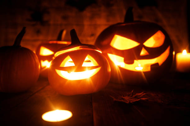 istock Halloween pumpkins and candles 865773544