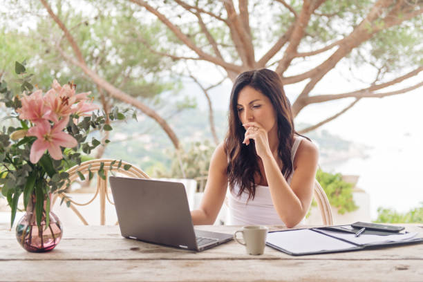 istock Woman working at home 865773856