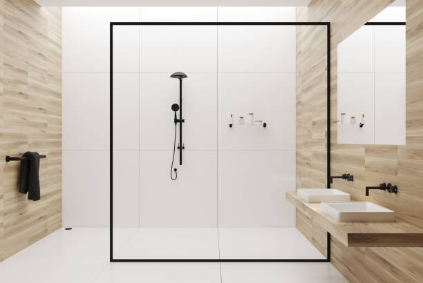 istock White and wooden bathroom shower and sinks 865774176