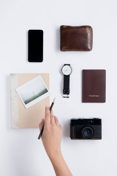 istock Flat lay of Human hand hold pencil and accessories 865780168