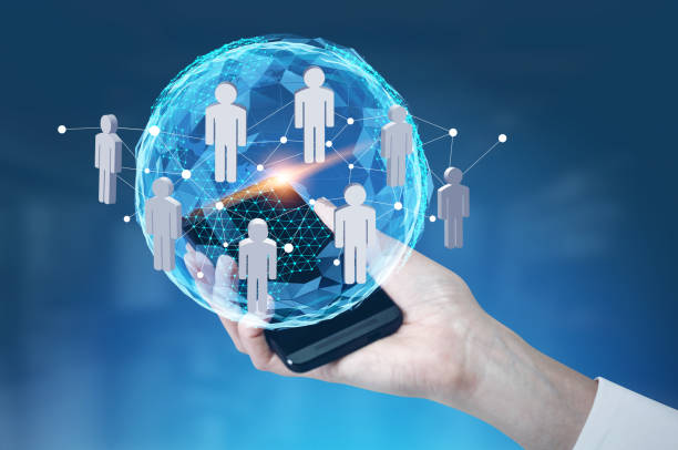 istock Woman s hand with a smartphone, planet network 865780868