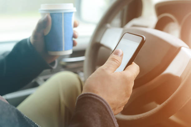 istock Male hand holding mobile phone 865781652