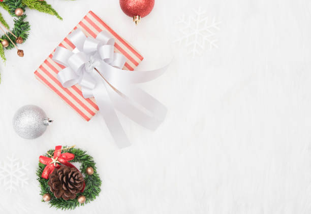 istock Christmas background with decorations and gift box copy space on white background. 865786184