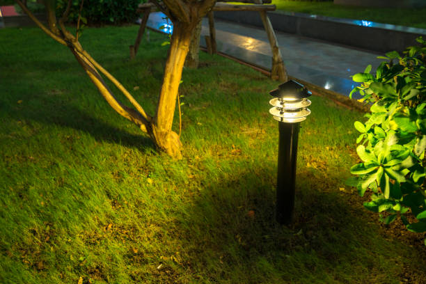 istock Blurred garden glowing decoration light in the park at night 865793314