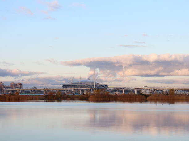 istock beach, bridge, stadium at sunset over the sea city 865797848