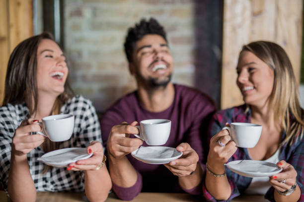 istock Young multi-ethnic group of people enjoying their coffee break 865798254