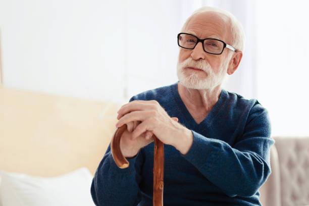 istock Thoughtful pensioner looking straight at camera 865800598