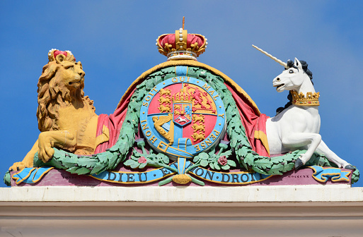 Gibraltar:  British Coat of Arms - Gibraltar courts service building -  Victorian period British royal crest - 'Dieu et mon droit' - 'Honi soit qui mal y pense' - photo by M.Torres