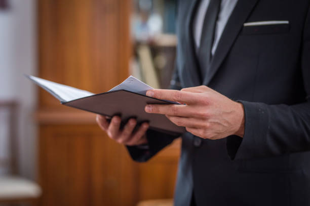 istock Businessman reviewing papers 865804042