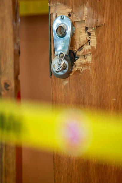 istock Break-in damage on doors with police band 865804128