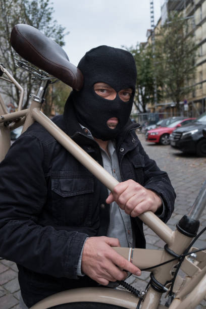 istock Theft wearing a balaclava stealing a bicycle 865804928