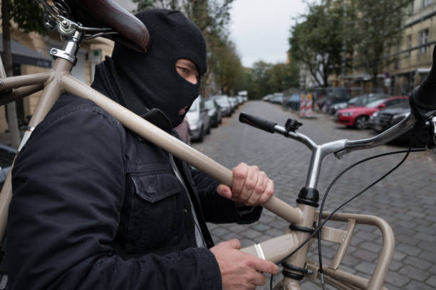 istock Theft wearing a balaclava stealing a bicycle 865804934