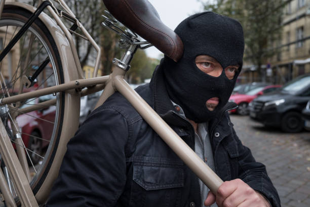 istock Theft wearing a balaclava stealing a bicycle 865804942