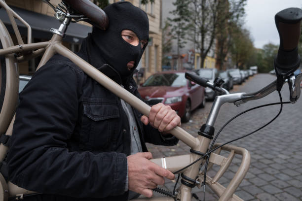 istock Theft wearing a balaclava stealing a bicycle 865804948