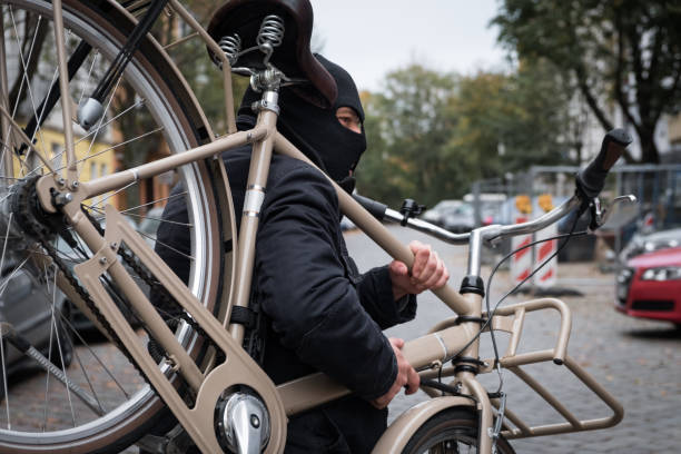 istock Theft wearing a balaclava stealing a bicycle 865805016