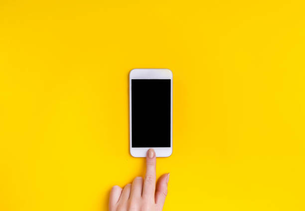 istock Top view of a woman hand using phone 865809370