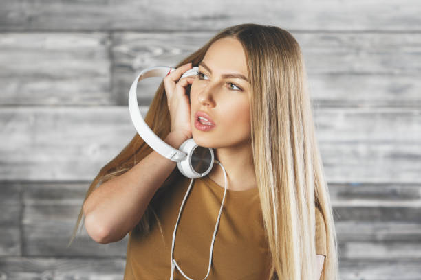 istock White woman with headphones 865812004