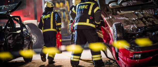 istock Firefigters at a car accident scene 865816592