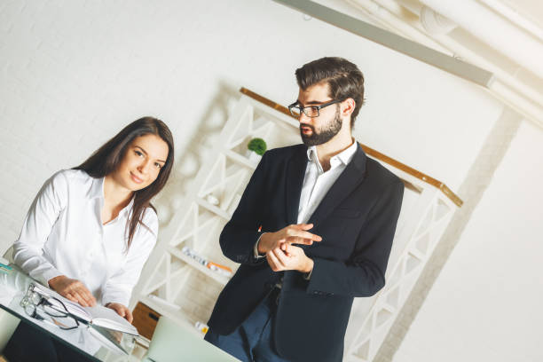 istock Caucasian man and woman working on project 865817144