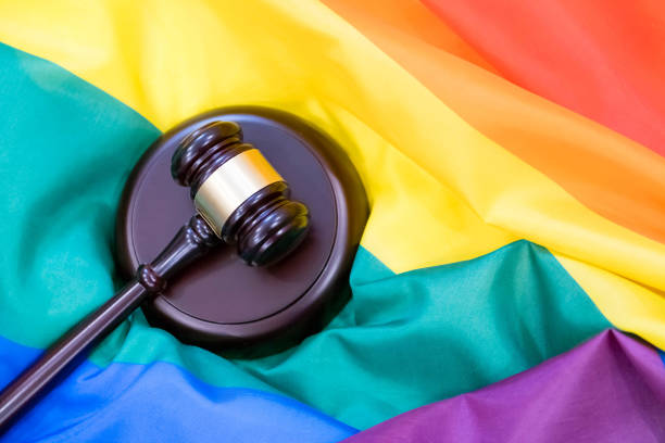 istock Hammer and gavel again against rainbow flag 865820754