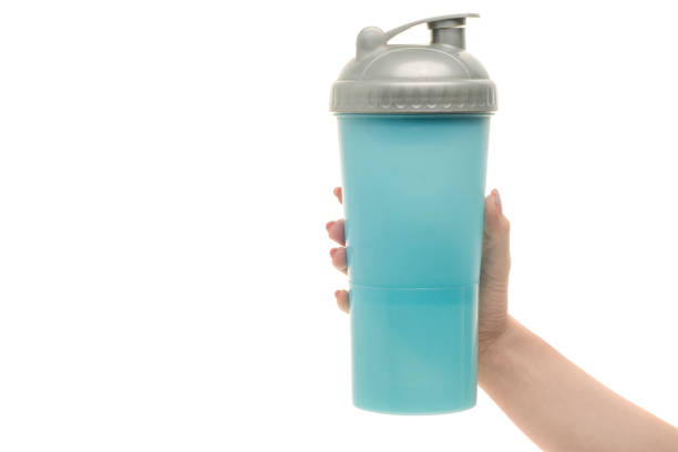 istock Blue sport shaker female hand 865821140