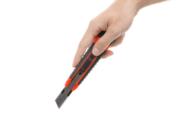 istock Clerical knife in a man's hand 865821156