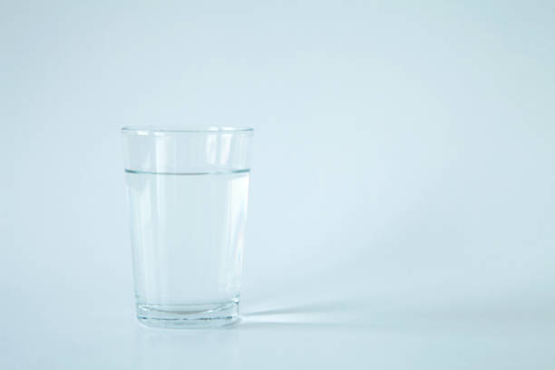 istock Water glass isolated on white background 865821492