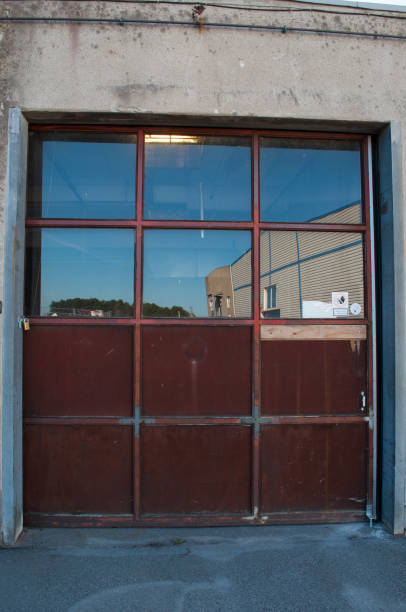 istock garage door in factory 865824472