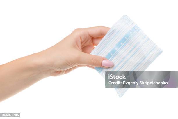 Sanitary Napkin In Female Hand Stock Photo - Download Image Now - Envelope, Multi-Layered Effect, Plastic