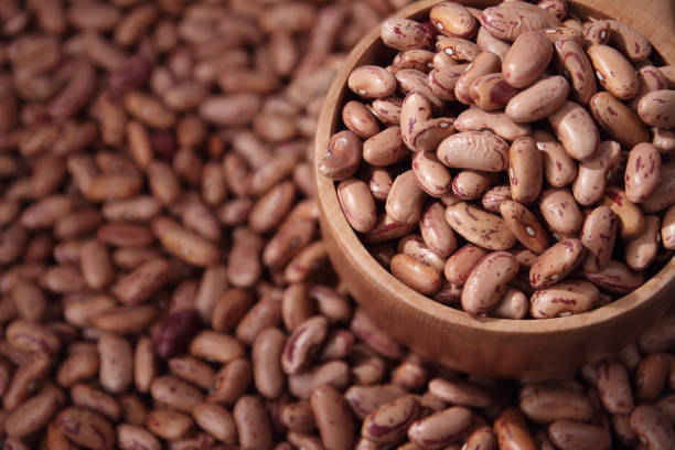 istock red adzuki beans with Wooden Scoop 865825906
